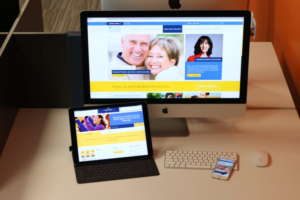  Photo of different branded content on computer, tablet, and smartphone.