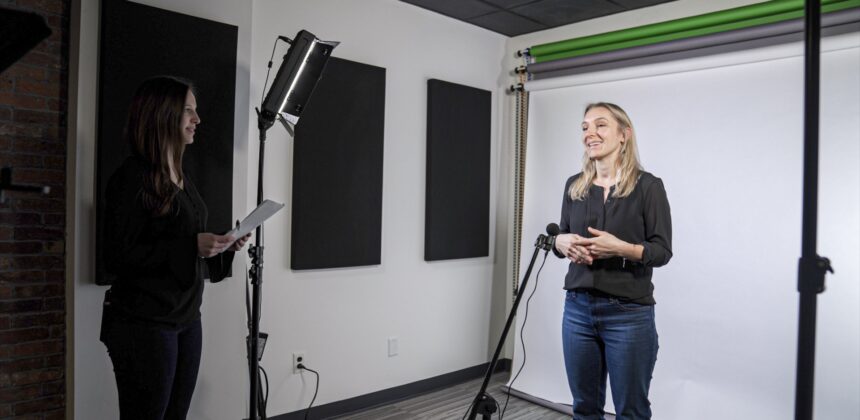 A Farotech employee records a short-form B2B marketing video in a professional studio setup, capturing engaging content for digital campaigns.